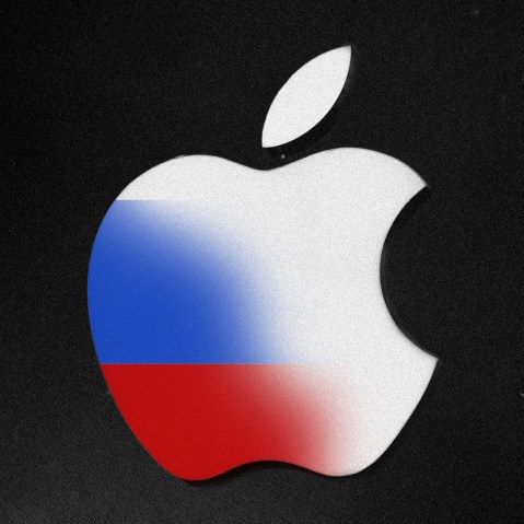 Photo illustration: The colors of the Russian flag fading off the Apple logo.