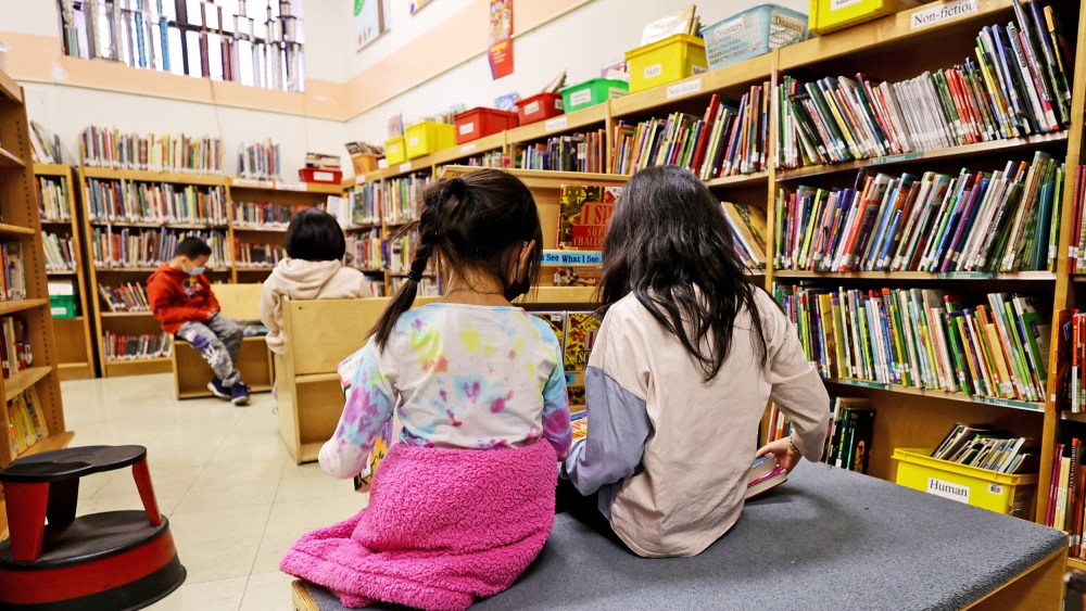 Students reading in the library.