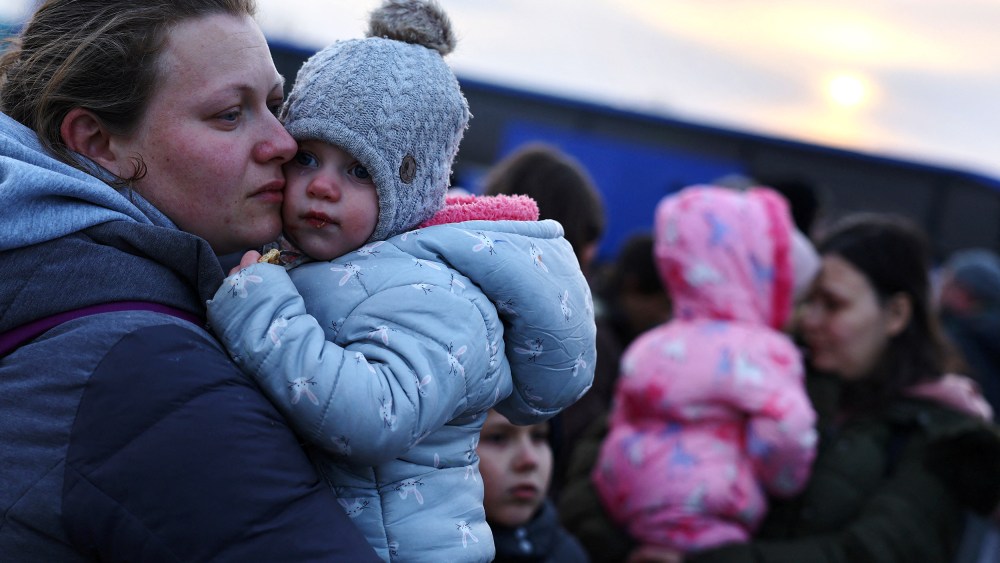 Image: Refugees arrive at the Polish border town of Przemysl after fleeing from Ukraine due to the Russian invasion