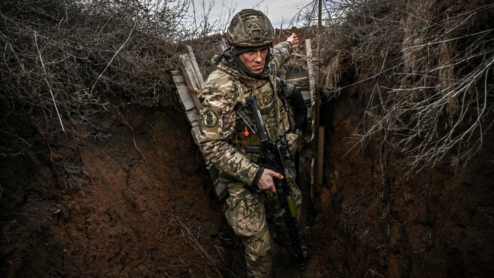 Image: Ukrainian troops patrol the frontline to the east on Feb. 19, 2022.