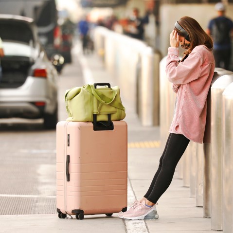 A woman leans in frustration