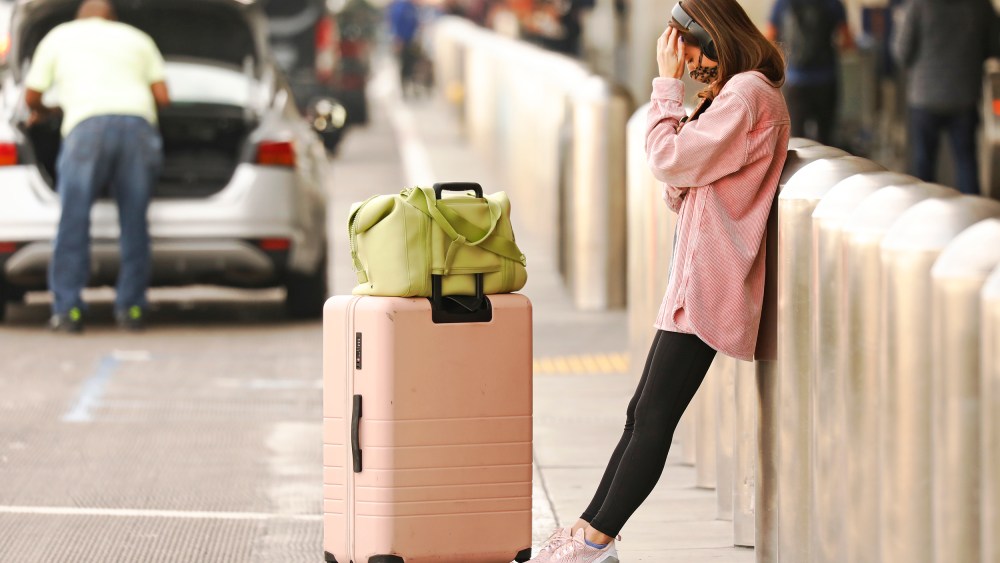 A woman leans in frustration