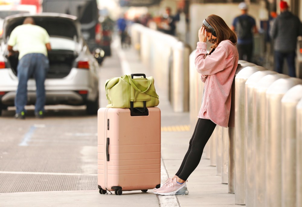 A woman leans in frustration