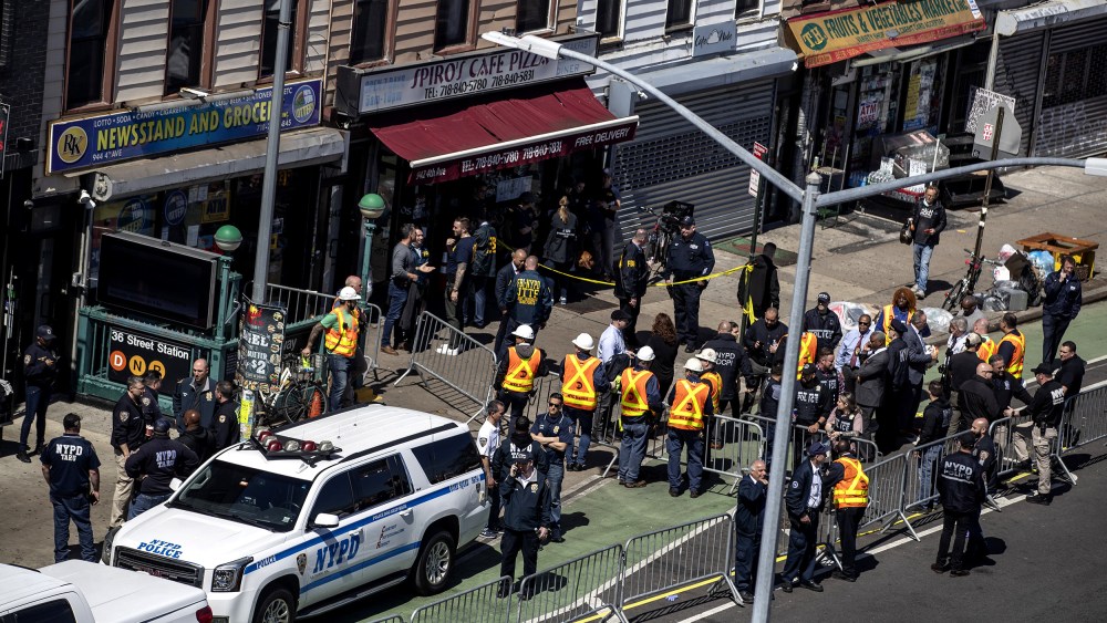 Image: Aerial view of law enforcements officers at the scene of a shooting at the 36th Street subway station in the Sunset Park neighborhood in Brooklyn, New York.