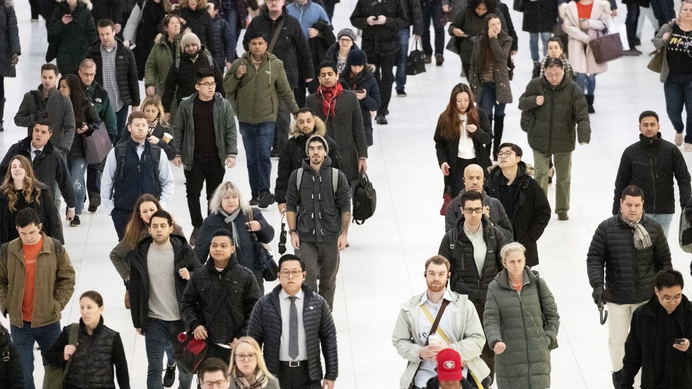 Image: Commuters walk along a corridor in the World Trade Center, New York.