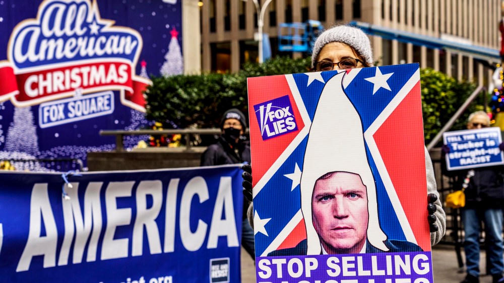 A protest group against Tucker Carlson and Fox News outside the News Corporation headquarters in New York, NY, in 2021.
