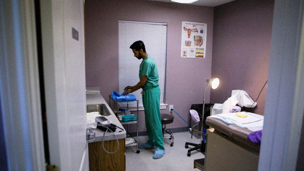 Image: Dr. Bhavik Kumar prepares a procedure room for a patient at Whole Woman's Health Clinic in Fort Worth, Texas, in 2016.