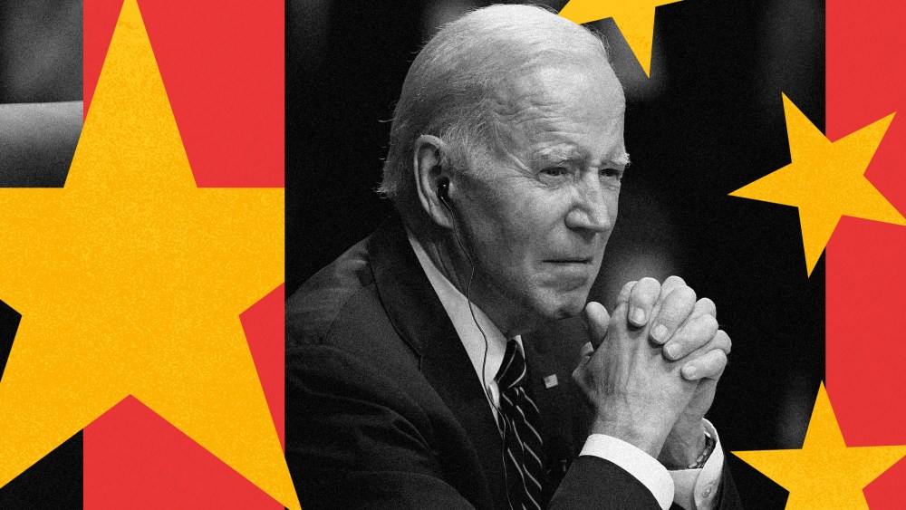 Photo illustration: Joe Biden sitting with folded hands between two red strips with overlapping yellow stars resembling the flag of China.