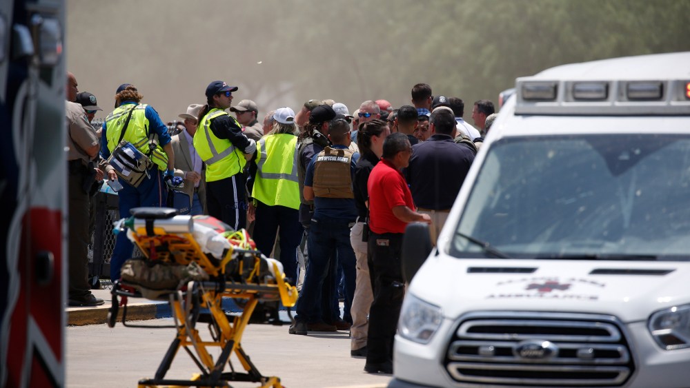 Image: Emergency personnel gathered near a shooting scene.