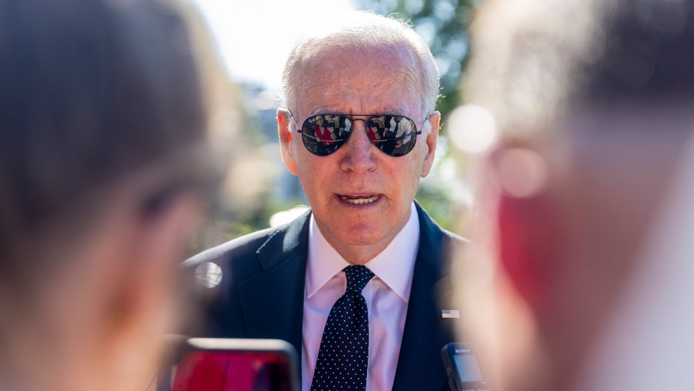 Image: Joe Biden speaks to the media on the south lawn of the White House.