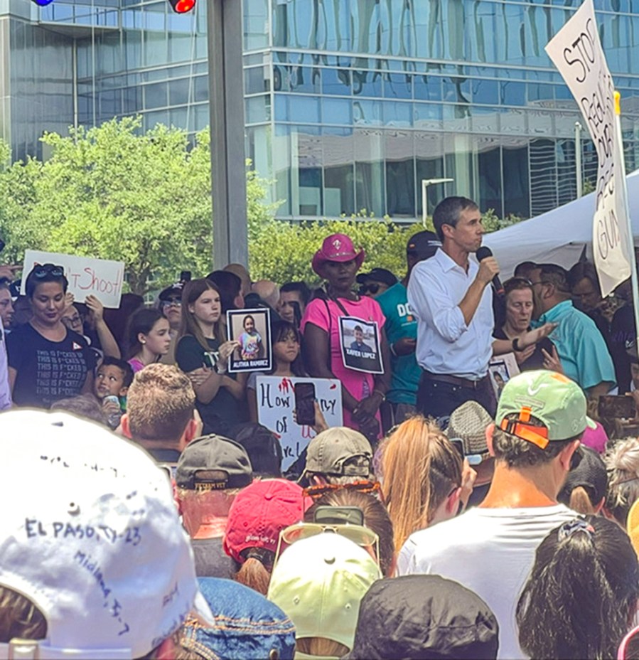 Rachel Dix, second from left onstage, a 5th grader at Travis Elementary in Houston, joins gubernatorial candidate Beto O'Rourke in a rally to protest the annual NRA meeting on Memorial Day weekend at the George R. Brown Convention Center.