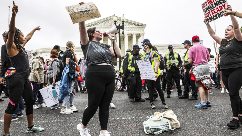 Abortion rights advocates protest outside the Supreme Court