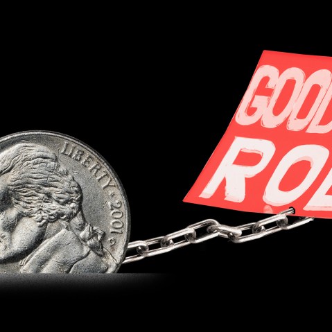 Photo illustration: A nickel chaining down a paper that reads,"Goodbye Roe".
