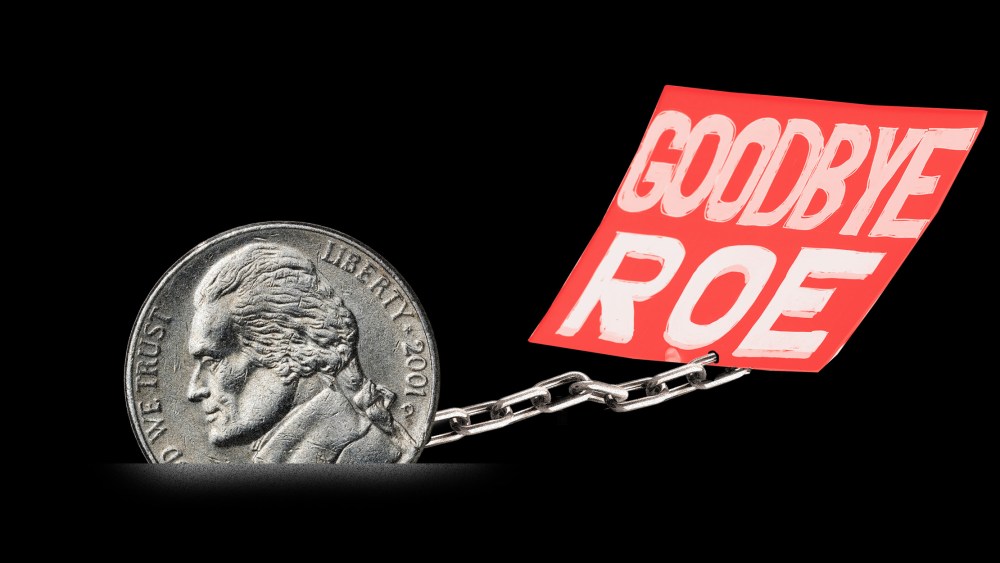 Photo illustration: A nickel chaining down a paper that reads,"Goodbye Roe".