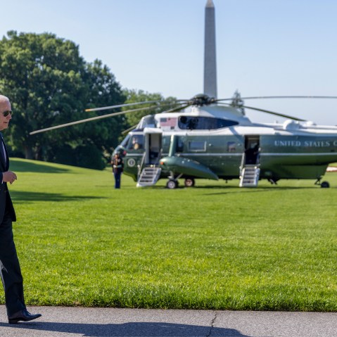 Image: Joe Biden walking on the white house lawn.