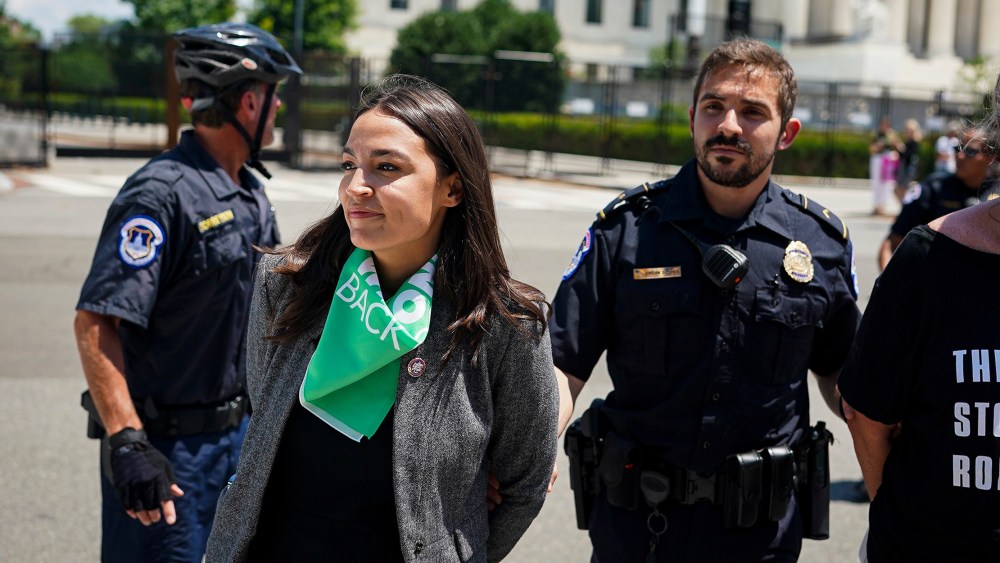 Image: Alexandria Ocasio-Cortez arrested outside the Supreme Court.