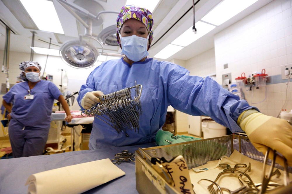 Surgical Tech Melissa Ellis prepares an OR room in the University of Mississippi Medical Center in Jackson, Mississippi, October 4, 2013. Mississippi is one of at least 20 states that has decided not to expand Medicaid under the Affordable Care Act.