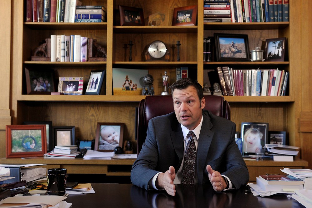 Kansas Secretary of State Kris Kobach talks about the Kansas voter ID law in his Topeka, Kan., office May 12, 2016. (Photo by Dave Kaup/Reuters)