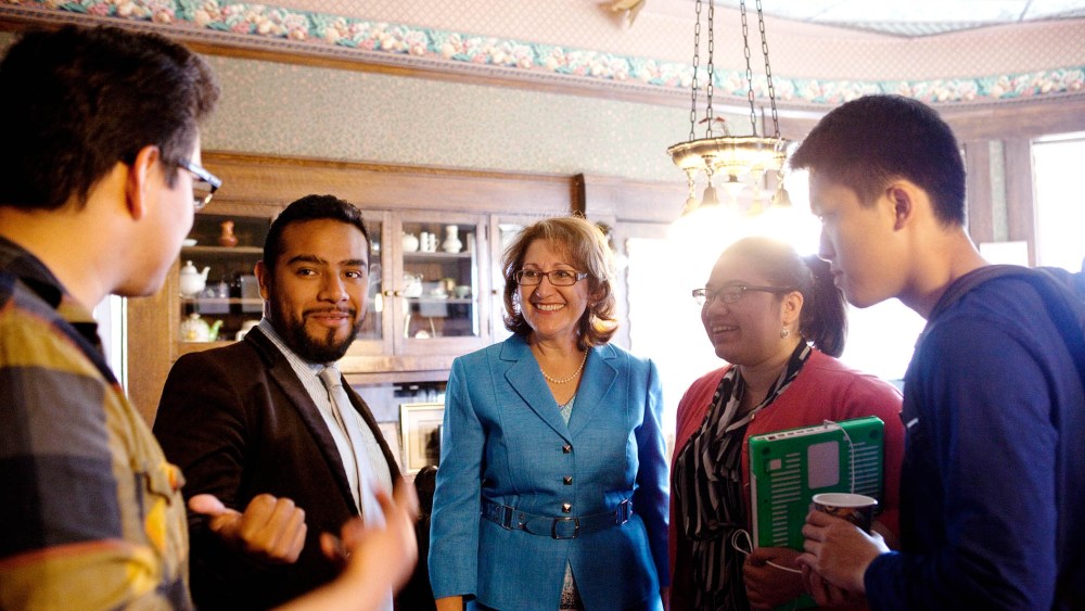 Eloise Gomez Reyes (center) talks to campaign volunteers at her law office, which is currently acting as her campaign headquarters, in Colton, CA on Feb. 11, 2014.
