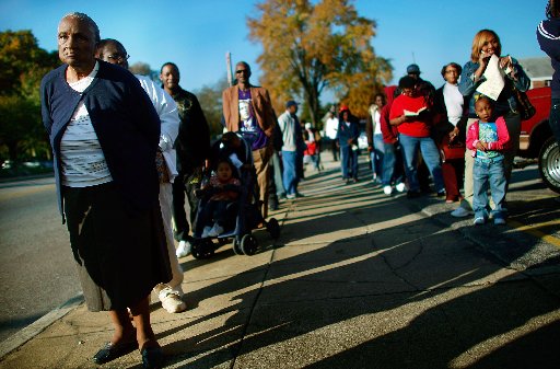 File Photo: African-Americans line up to vote in the presidential election November 4, 2008 in Birmingham, Alabama. (Photo by Mario Tama/Getty Images)