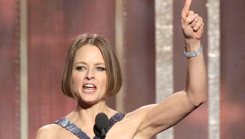 A handout picture provided by NBC Universal on 13 February 2013 shows US actress Jodie Foster receiving the Cecil B. Demille award from US actor Robert Downey Jr (R) during the 70th annual Golden Globe Awards held at the Beverly Hilton Hotel, in...