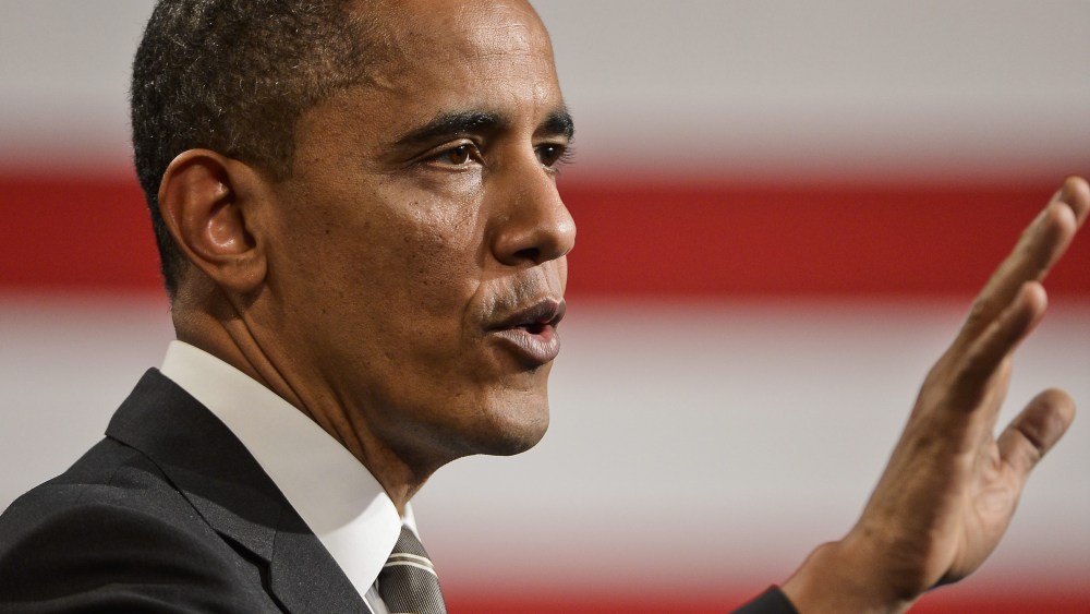 US President Barack Obama gestures as he speaks at Hyde Park Academy  in Chicago, Illinois, USA, 15 February 2013. Obama is calling for a raise to the federal minimum wage, job training and marriage for low income families on his post State of the...