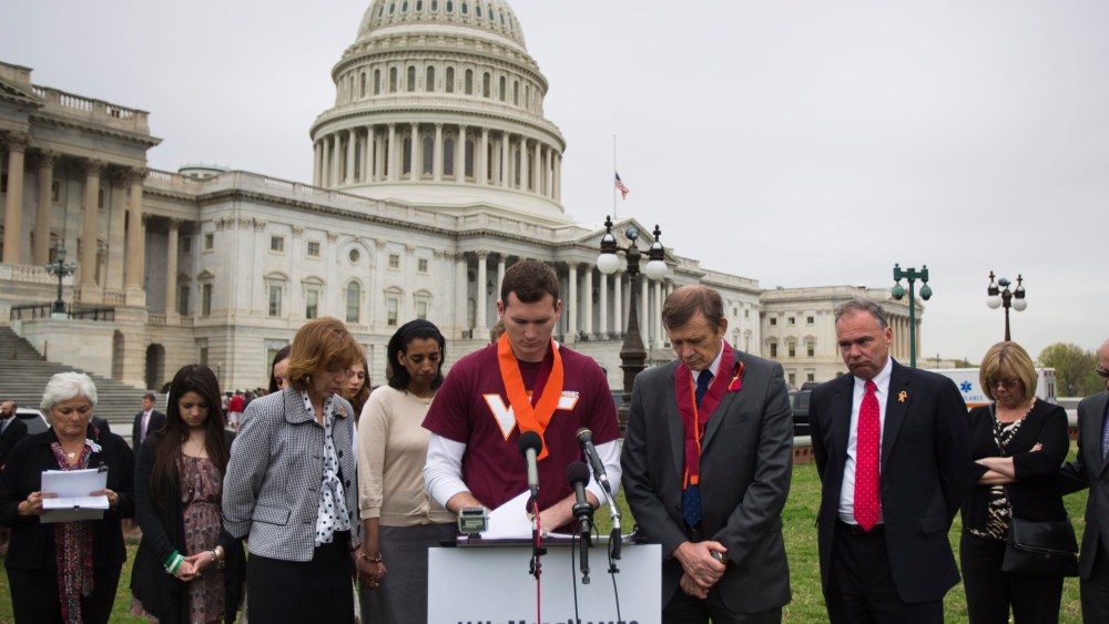 On the sixth anniversary of the Virginia Tech shooting, Colin Goddard, who was shot four times, leads a moment of silence for the 32 victims, along with the '3,300 lives lost to gun violence since the Newtown shooting,' outside the U.S. Capitol in...