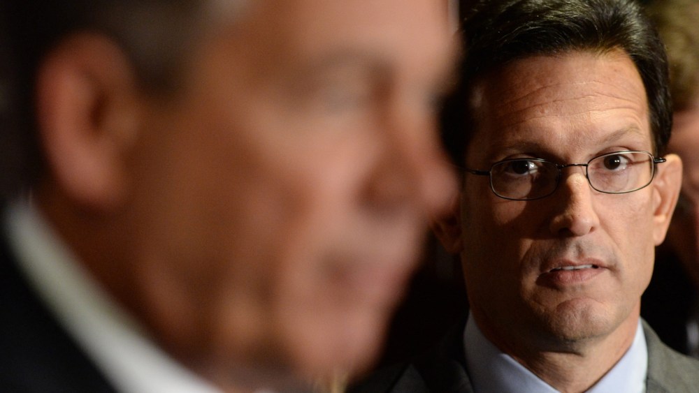 House Majority Leader Eric Cantor watches House Speaker, Republican John Boehner, speaking at a news conference on Capitol Hill in Washington D.C., October 23, 2013.