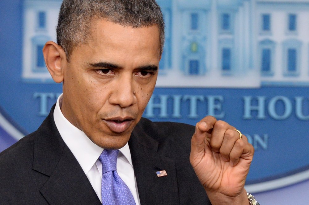 President Barack Obama speaks during a news conference, at the White House in Washington, D.C., December 20, 2013.