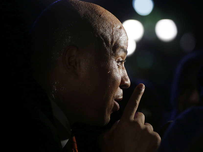 Newark Mayor and U.S. Senate candidate Cory Booker greets supporters after winning the Democratic primary election for the seat vacated by the late U.S. Sen. Frank Lautenberg, Tuesday, Aug. 13, 2013, in Newark, N.J. (Photo by Mel Evans/AP)