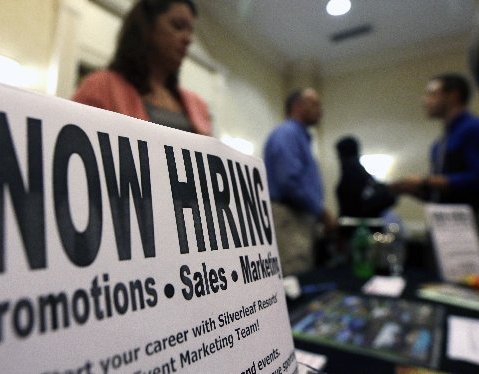 A sign attracts job-seekers during a job fair at the Marriott Hotel in Colonie, N.Y. The October employment report the government will release Friday, Nov. 2, 2012 will likely solidify the picture of the U.S. job market that’s emerged this year:...