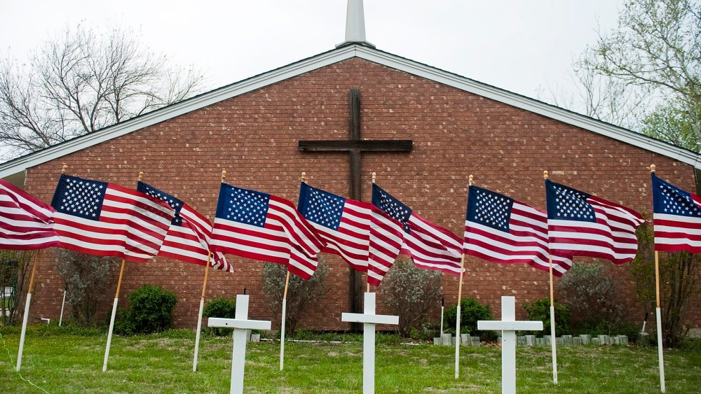 U.S. flags and crosses representing victims of the shooting at Fort Hood military base are displayed outside Central Christian Church in Killeen, Texas, April 3, 2014.