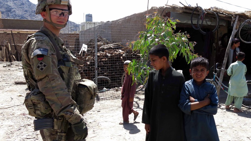 A U.S. NATO soldier visits a market of Kandahar, Afghanistan, May 27, 2014.