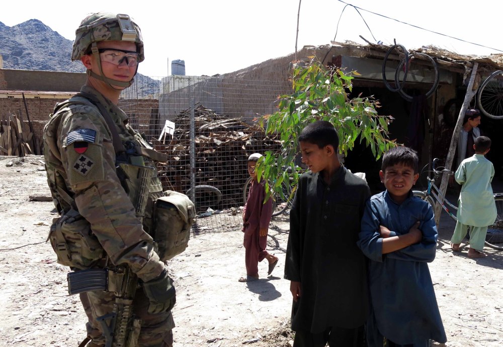 A U.S. NATO soldier visits a market of Kandahar, Afghanistan, May 27, 2014.