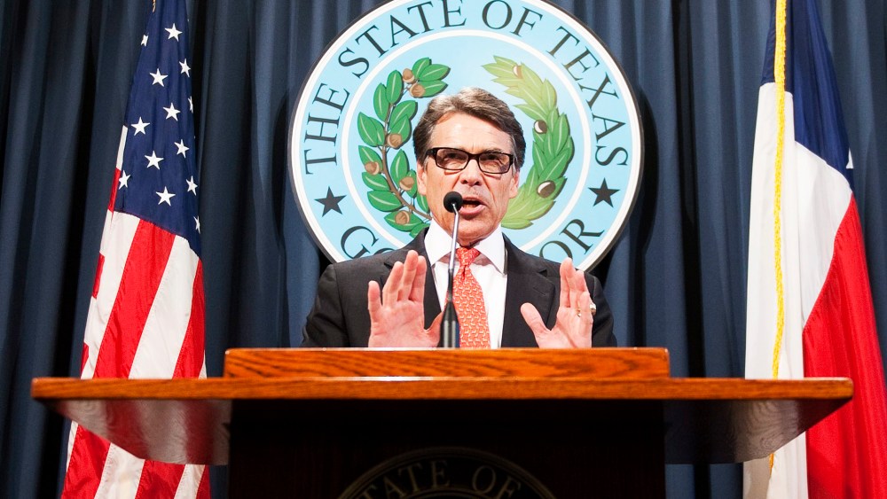 Texas Governor Rick Perry makes a statement regarding his grand jury indictment on charges of abuse of power at the Texas state capitol, August 16, 2014.