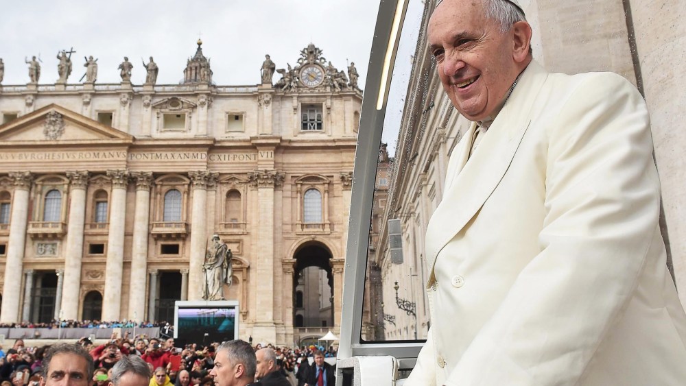 Pope Francis arrives to his Wednesday's General Audience in St. Peter's Square, Vatican City, on Dec. 3, 2014. (L'OSSERVATORE ROMANO/EPA)