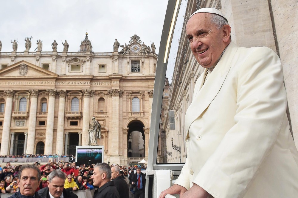 Pope Francis arrives to his Wednesday's General Audience in St. Peter's Square, Vatican City, on Dec. 3, 2014. (L'OSSERVATORE ROMANO/EPA)