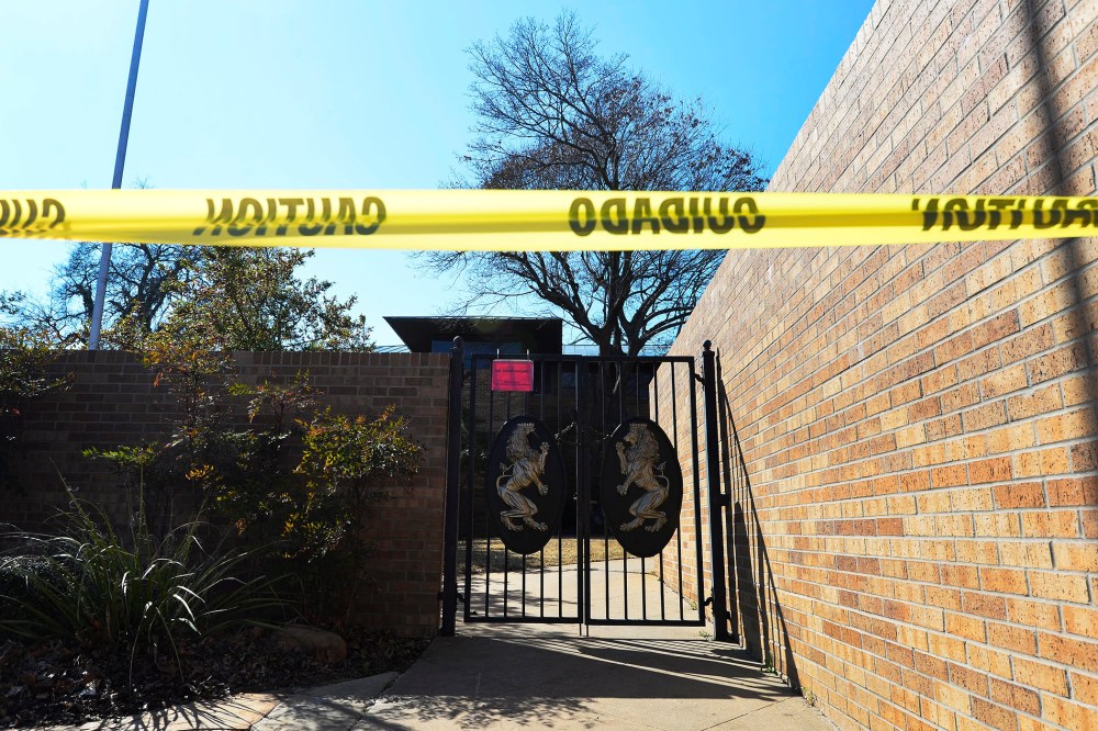 A view of the locked gates at the closed and abandoned Sigma Alpha Epsilon, SAE fraternity house on the campus of Oklahoma University in Norman, Okla., on March 11, 2015. (Photo by Larry W. Smith/EPA)