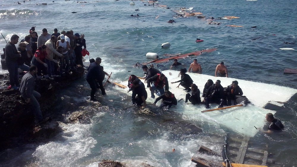 Migrants arrving at Zefyros beach at Rhodes island, Greece on April 20, 2015.