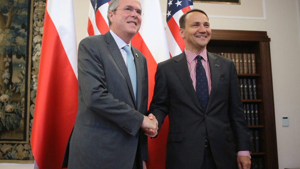 Polish Parliament Speaker Radoslaw Sikorski (R) shakes hand with U.S. politician Jeb Bush (L) before their meeting in Warsaw, Poland, June 11, 2015. (Photo by Laszek Szymanski/EPA)