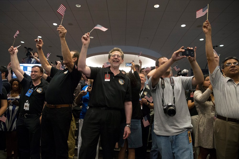 New Horizons spacecraft Pluto flyby (Photo by Michael Reynolds/EPA)