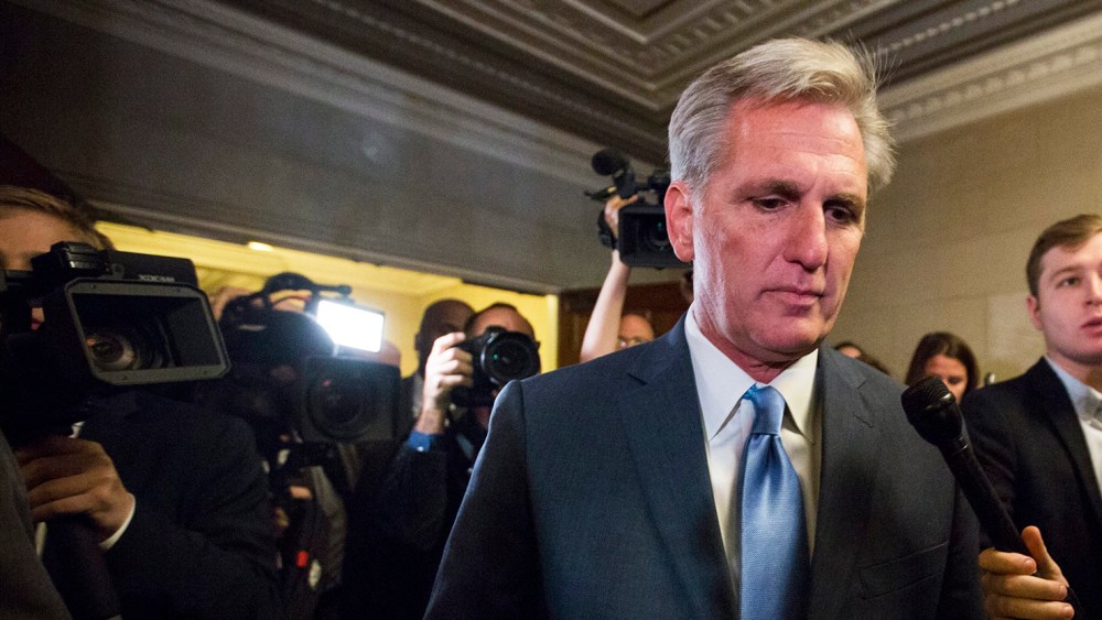 House Republican Leader Kevin McCarthy prepares to speak to the media after unexpectedly dropping out of consideration to be the next Speaker of the House on Capitol Hill in Washington, D.C., on Oct. 8, 2015. (Photo by Jim Lo Scalzo/EPA)