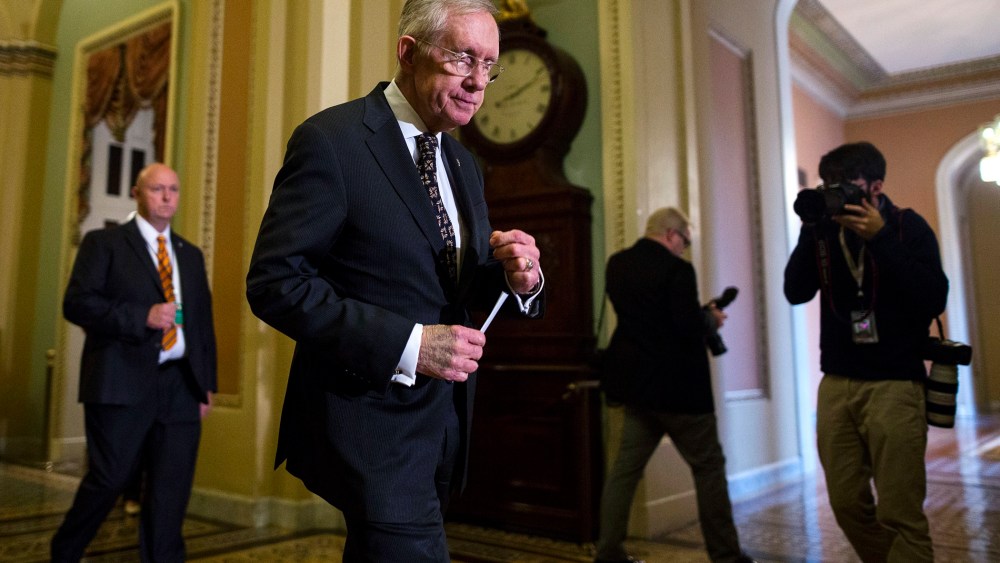 Democratic Senate Minority Leader from Nevada Harry Reid prepares to speak to the media in the US Capitol in Washington, DC, 27 Oct. 2015. (Photo by Jim Lo Scalzo/EPA)