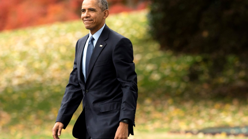 President Barack Obama walks on the South Lawn of the White House in Washington, D.C., on Nov. 2, 2015. (Photo by Michael Reynolds/EPA)