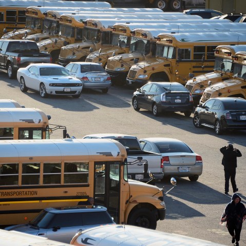 Los Angeles Unified school district buses, Dec. 15, 2015. (Photo by Paul Buck/EPA)