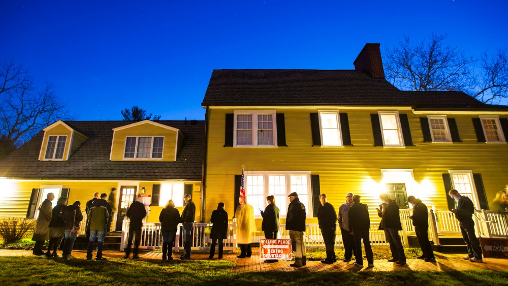 Virginia residents wait in line in the pre-dawn hours to vote in the Virginia primary at a historic property called the Hunter House at Nottoway Park in Vienna, Va., on March 1, 2016. (Photo by Jim Lo Scalzo/EPA)