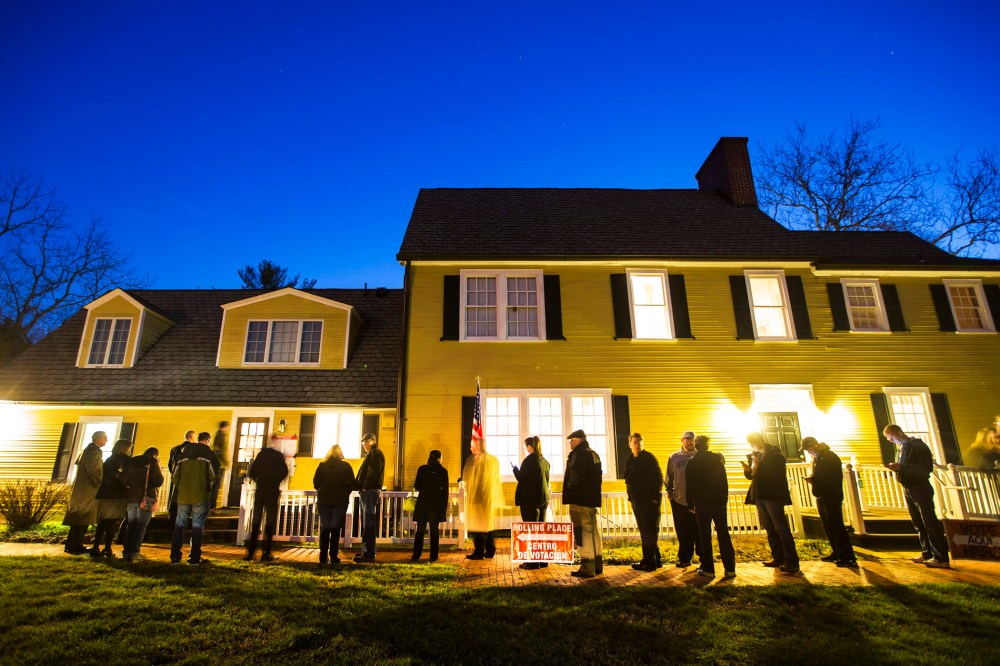 Virginia residents wait in line in the pre-dawn hours to vote in the Virginia primary at a historic property called the Hunter House at Nottoway Park in Vienna, Va., on March 1, 2016. (Photo by Jim Lo Scalzo/EPA)