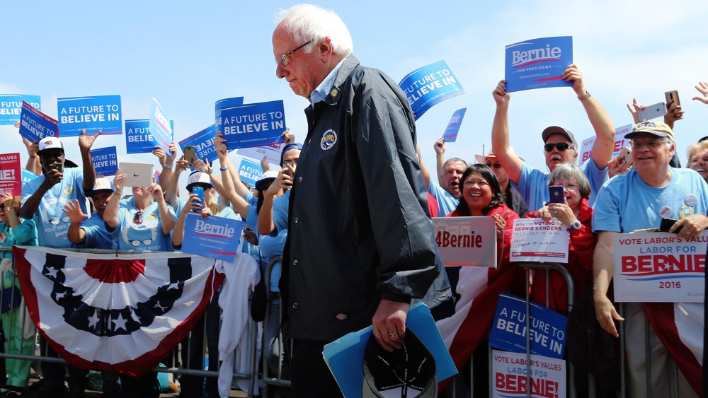 Democratic presidential candidate Bernie Sanders makes his way to the podium to address supporters outside the Los Angeles Maritime Museum in San Pedro, Calif., May 27, 2016. (Photo by Mike Nelson/EPA)