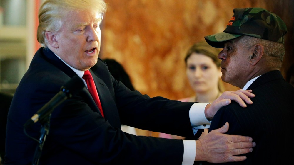 Republican presidential candidate Donald Trump thanks veteran Al Baldasaro after he addressed the media during a speech on Veteran affairs in the lobby of Trump Tower in New York, May 31, 2016. (Photo by Jason Szenes/EPA)