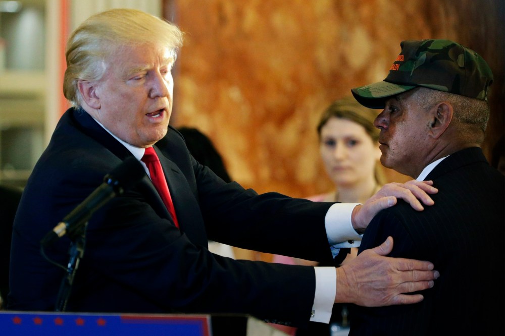 Republican presidential candidate Donald Trump thanks veteran Al Baldasaro after he addressed the media during a speech on Veteran affairs in the lobby of Trump Tower in New York, May 31, 2016. (Photo by Jason Szenes/EPA)
